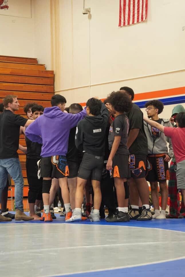 Wrestling team huddle